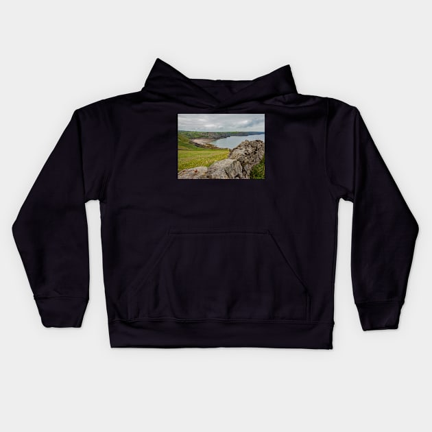 A view of Fall Bay on the South Welsh coast from the cliffs of the Welsh Coastal path Kids Hoodie by yackers1